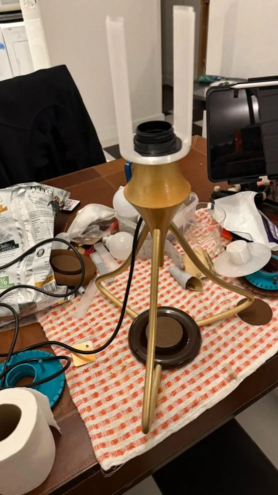 Assembled prototype on the bench, legs and base finished, shade being fitted