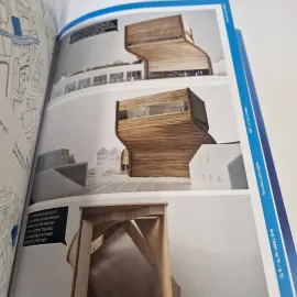 Reference book with stacked cardboard furniture