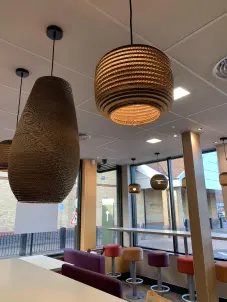 Cardboard pendant lamp in a restaurant interior