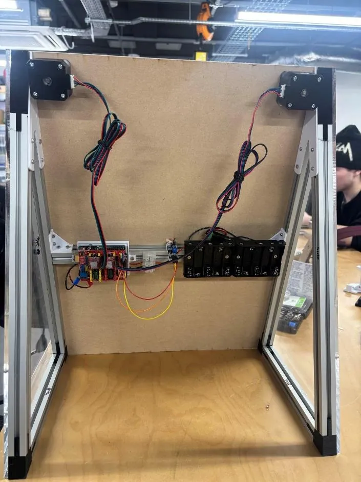 The back of the prototype showing the Arduino, CNC shield and wiring mounted on the board